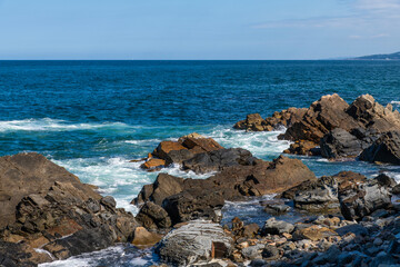 View of the rocks and surf on the sea