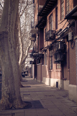 Fototapeta premium Quiet Urban Scene with Vintage Brick Architecture