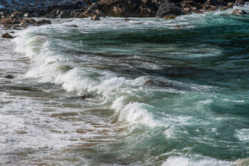 surf on the rocky beach
