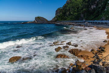 surf and beach with the seaside footpath
