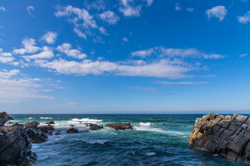 View of the rocks and surf on the sea