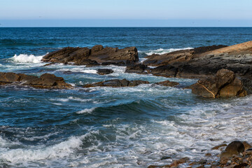 View of the rocks and surf on the sea