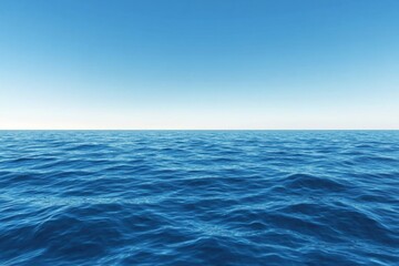 Fototapeta premium An endless blue ocean under a clear day sky .