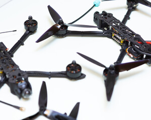 FPV drone in production on white background.
