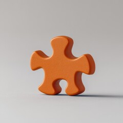 Obraz premium Orange Puzzle Piece on Grey Background