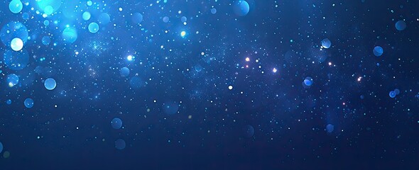 Abstract blue bokeh background with glittering lights