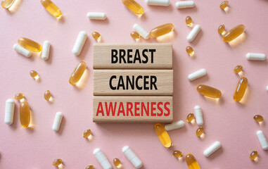 Breast Cancer Awareness symbol. Concept word Breast Cancer Awareness on wooden blocks. Beautiful...