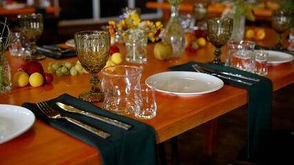 Warm string lights beautifully illuminate the night among tall trees in a serene forest setting, creating a magical outdoor ambiance