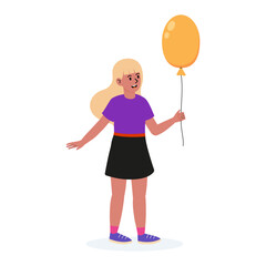 Girl holding a yellow balloon and smiling in a playful outdoor setting