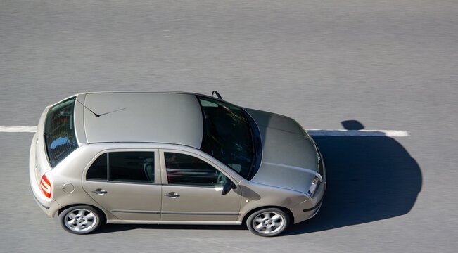 Silver Skoda Fabia with motion blur effect, top side view