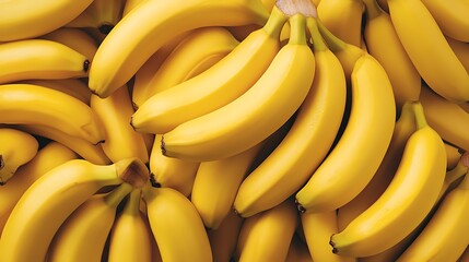 Ripe bananas piled high, close-up view, market display