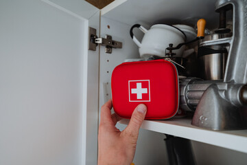 Our kitchen cabinet is stocked with a wellequipped first aid kit, always ready to help in case of emergencies or accidents that may occur during cooking or other activities