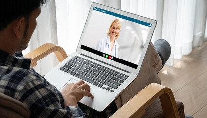 Doctor video call online by modish telemedicine software application for virtual meeting with patient