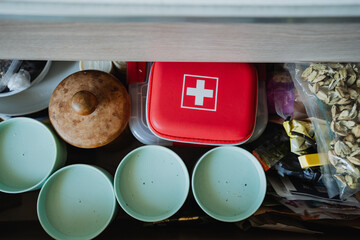 A wellorganized kitchen drawer is essential, holding a First Aid Kit, serving bowls, and snacks for quick access, ensuring convenience and efficiency in cooking