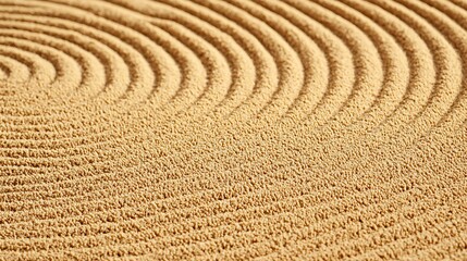 Naklejka premium Sand ripples form circular patterns, creating textures, used for abstract art, backgrounds
