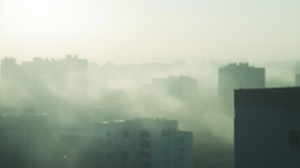 Foggy cityscape aerial view at sunrise