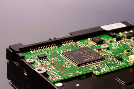 Close-up view of the internal circuitry of a hard disk with INFINEON chips, February 25, 2025