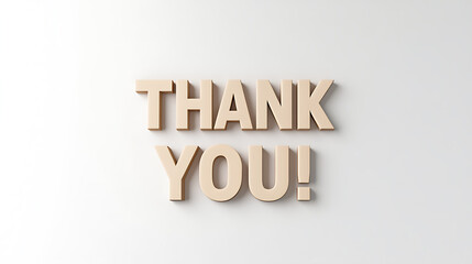 Appreciation: A simple message of gratitude conveyed through raised beige lettering on a plain white background, offering a visual expression of thanks.