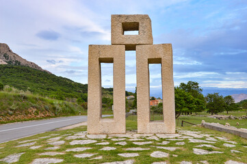 Stone sculpture representing  letter L. Part of Glagolitic Alphabet Trail Baska. Glagolitic script is the oldest known Slavic alphabet from 9th century