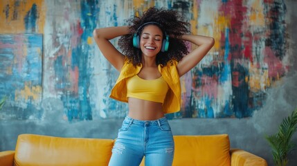 Naklejka premium Young Woman Dancing Playfully with Headphones On.
