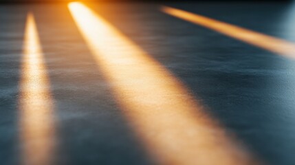 sunlight streaks on a concrete floor