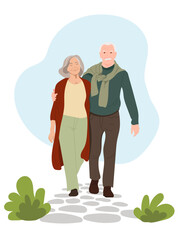 Elderly couple walking in nature.