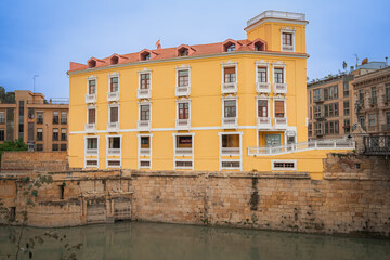 Old historical building along the Segura river in Murcia, Spain