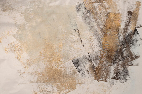 Brown, gold, bronze, beige art Abstract grunge ink painting texture grain dot blot. Monotype dirty scratch stain background.