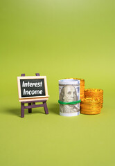 Interest income and a stack of money. Profits earned through interest rates, passive income strategies, wealth accumulation, banking services, and financial planning for future stability.