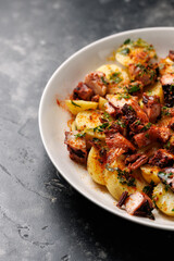 Octopus tentacles and new potatoes warm salad with smoked paprika dressing