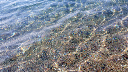 Much stones in the sea, river, lake, ocean water. Nature background.