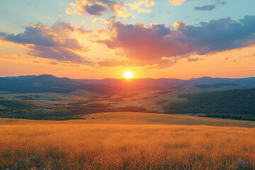 Fototapeta premium Golden Sunset Over Rolling Hills and Grasslands