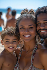 Fototapeta premium A family of three smiles for a close up photo on a crowded beach on a bright, sunny day. Happiness and vacation.
