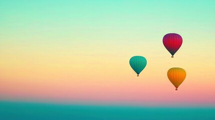 Fototapeta premium A panoramic view of vibrant hot air balloons soaring majestically across serene water, bathed in the ethereal glow of a radiant sunset
