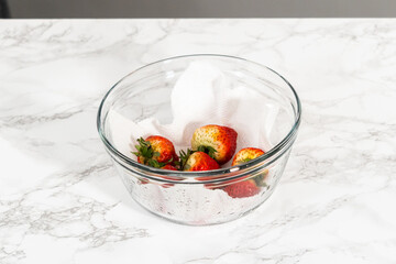 Washed and Dried Strawberries Neatly Stored in a Glass Bowl