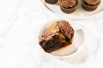 Chocolate Cupcake Sliced in Half on Kitchen Counter