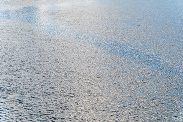 Various colors reflected on the surface of the water