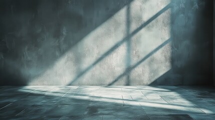 Fototapeta premium Sunlight streaming through window onto empty room with textured walls and tiled floor