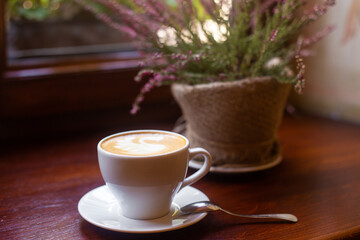 a cup of fragrant coffee in a restaurant on the table