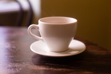 a cup of fragrant coffee in a restaurant on the table