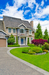 Two story luxury house with beautiful summer  landscape in Vancouver, Canada, North America. Day time on June 2024.