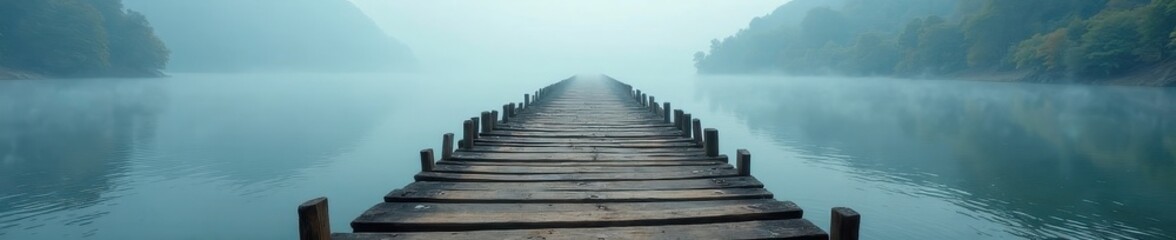 Fototapeta premium Ancient wooden pier extends into foggy river, stone foundation visible, white, scenic
