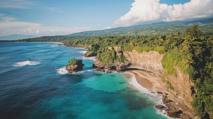 Fototapeta premium Aerial view of a serene tropical coastline with lush greenery and gentle waves under a blue sky
