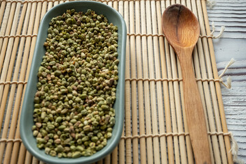 close up of fresh green thyme a blue bowl	