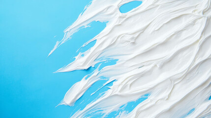 Obraz premium Abstract foam texture on bright blue background for creative design projects