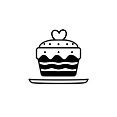 A single-serving, blackand-white cupcake with a heart shaped topping and a dotted arrangement on its top, on a plate.