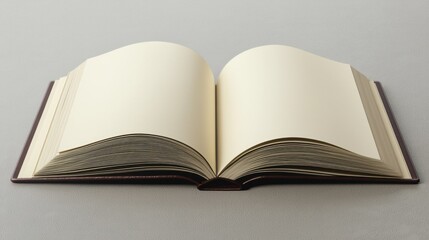 Open Blank Book on Grey Surface for Creative Writing and Inspiration