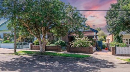 Old Federation Double Brick house in an inner western Sydney Suburb at beautiful colourful sunset NSW Australia