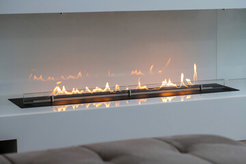 Burning eco bio ethanol fireplace built into furniture