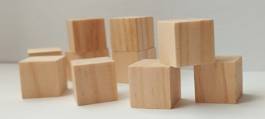 Building creativity wooden blocks stacked in artistic formation minimalist studio still life...